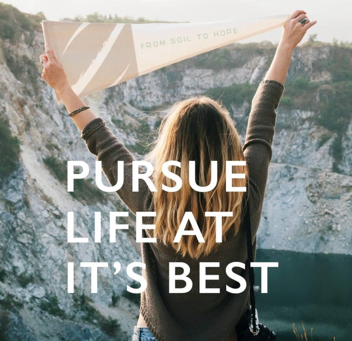 A picture of a lady pursuing life at it's best with a zakah life celebration flag