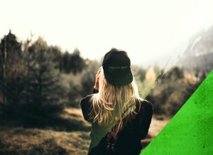 A zakah life made picture of a girl standing in the mountains